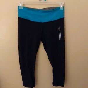 Lululemon Black and Teal Cropped Leggings "14 Across Waist